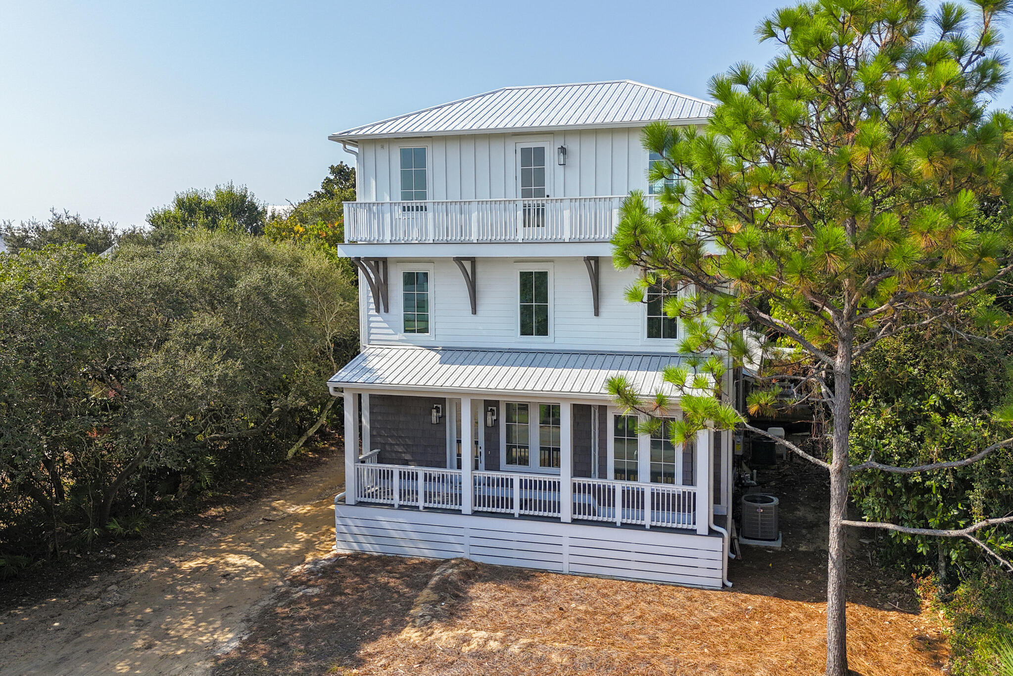 Located on the highly desirable west end of 30A, this property presents a rare opportunity for investors or buyers looking to create value in one of the area's most sought after beach communities. Set on approximately a quarter-acre lot, the home features a newly constructed 1,687 sq ft wing adding a living space, owner's suite and 3 full baths, offering a solid foundation for future plans. Four beach accesses surround the home, including the Dune Allen Regional Beach Access just at the end of the street. Outdoor enthusiasts will also appreciate being so close to Topsail Preserve State Park, where 3.2 miles of pristine, secluded beach, coastal dune lakes and nature trails awaits. This is the best beach area that our Emerald Coast offers as feels like you have it all to yourself. The lifestyle here is enhanced by an array of nearby dining and entertainment options. Enjoy breathtaking waterfront views at the Vue on 30A, savor fresh local flavors at Stinky's Fish Camp, Shunk Gully, or explore the shopping and dining at Gulf Place, all right around the corner from the home. This property is ideally situated for both lifestyle and rental potential.
The original structure, a 2-bedroom, 2-bath home, was built in 1974 and is positioned behind the new wing and has undergone some updates but leaves ample room for vision. Whether you're looking to remodel, rebuild, or reimagine, this property offers a prime location and the flexibility to create a truly custom retreat along 30A. Don't miss the chance to make your mark with this unique investment opportunity. Schedule your showing today and explore the countless possibilities this distinctive home has to offer!