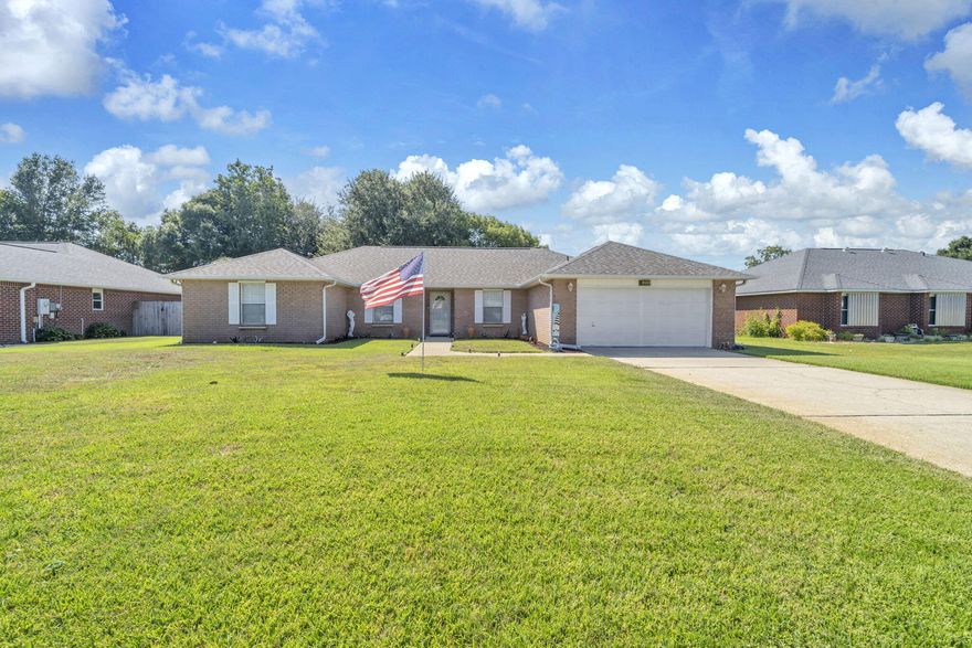 Cimarron floor plan.  One owner home in Raintree.  All brick home with nice large rooms.  As you walk into your home you have your living room to your left and your formal dining to your right and your Family room is directly in front of you. You will love the fireplace for those cozy Winter nights. In your family room you have sliders that lead out to your 12x20 Florida room.  Large back yard that is waiting for your pool.  The eat in kitchen with a large island is to the right of the Family room.  You also have an entrance from the formal dining.  Your 17x15 master suite and ensuite are to the right of the kitchen.  Your ensuite has both a large soaking tub but a separate shower.  Large double sink counter.  On the other side of the house is your 3 guest bedrooms and guest bathroom. Your laundry room is between your kitchen and the garage.  You have a lawn pump and a sprinkler system to help maintain your yard.  Pull down steps in the garage.