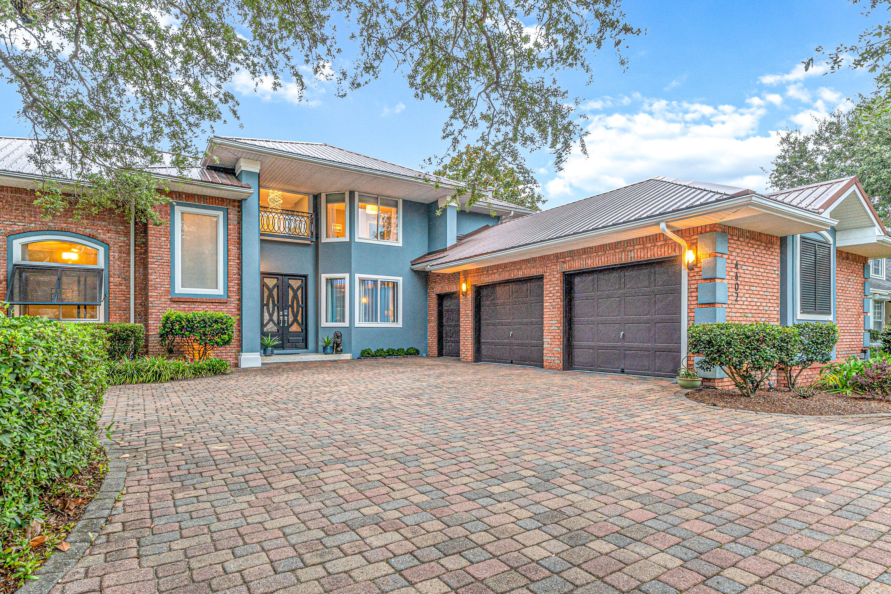 Opulent and meticulously detailed, this lush waterfront home is a breathtaking example of design and show-stopping livability. A sweeping staircase adorned with designer railings compliments a backdrop of tranquil bay views. The inviting open floor plan creates ease of living and ample entertaining spaces to sit and absorb the spectacular vistas from every angle. Recline with your morning coffee in the privacy of your personal lanai and watch dolphins swim past your dock, then unwind at the end your day with spectacular sunset skies and fireworks across the harbor. Every detail of this home has been thoughtfully, artistically and masterfully designed. Because of the quality upgrades completed by sellers, county has changed effective year of home to 2007!!