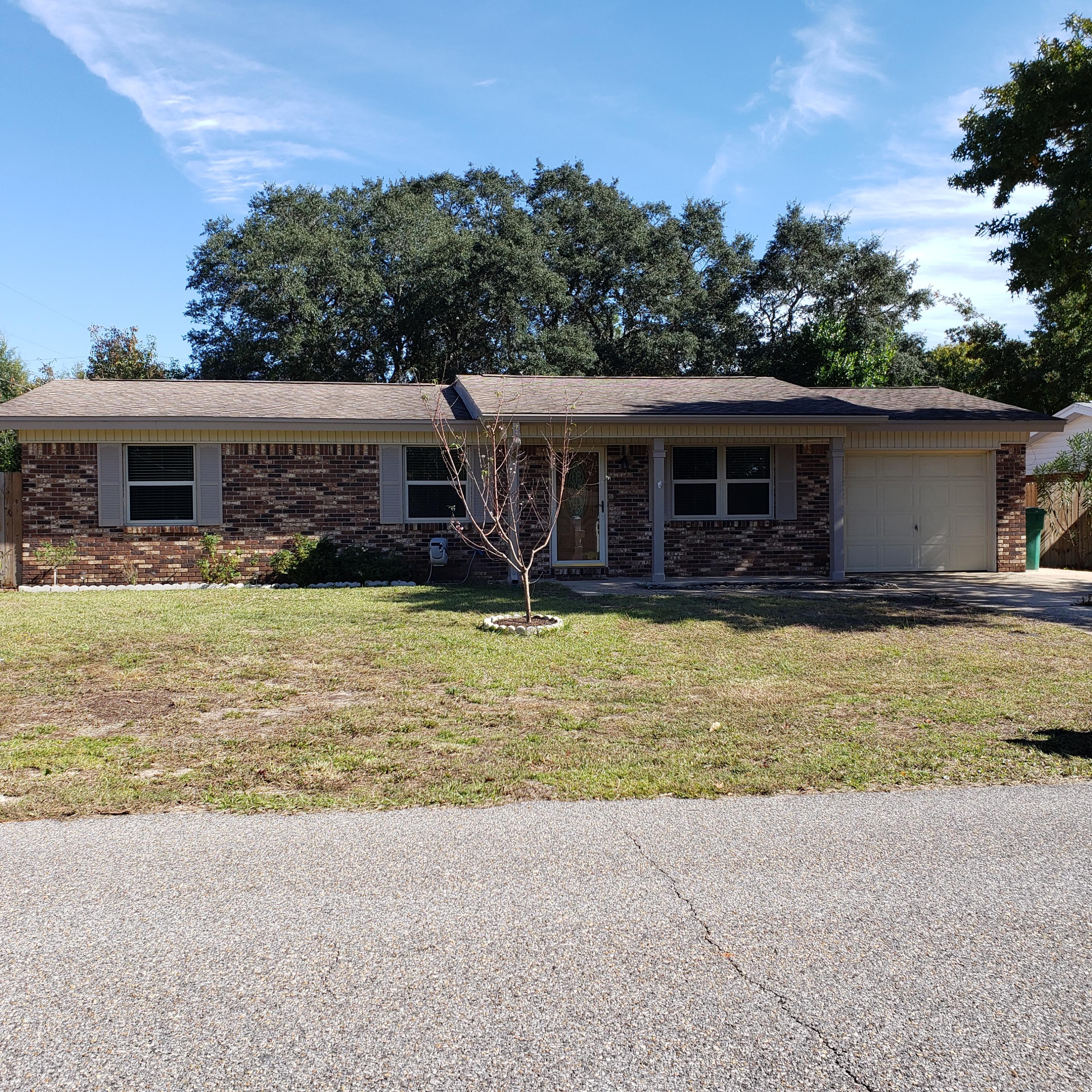 This well-maintained property has been updated with NEW carpeting in all 3 bedrooms and NEW flooring in the living/dining/den. areas. The interior has been freshly painted, as well. Just minutes from Eglin AFB, shopping and dining, and the beautiful white sand beaches. The backyard is a nice, spacious retreat for grilling and gatherings, along with a covered patio. Storage shed conveys with property as-is. For the golf enthusiasts, it is just a quick drive to Shalimar Pointe Golf & Country Club.*Impact-resistant windows installed 2012* *Property does have Aluminum wiring (Insurance and Re-wire Quotes attached)**Professional Photos forthcoming**