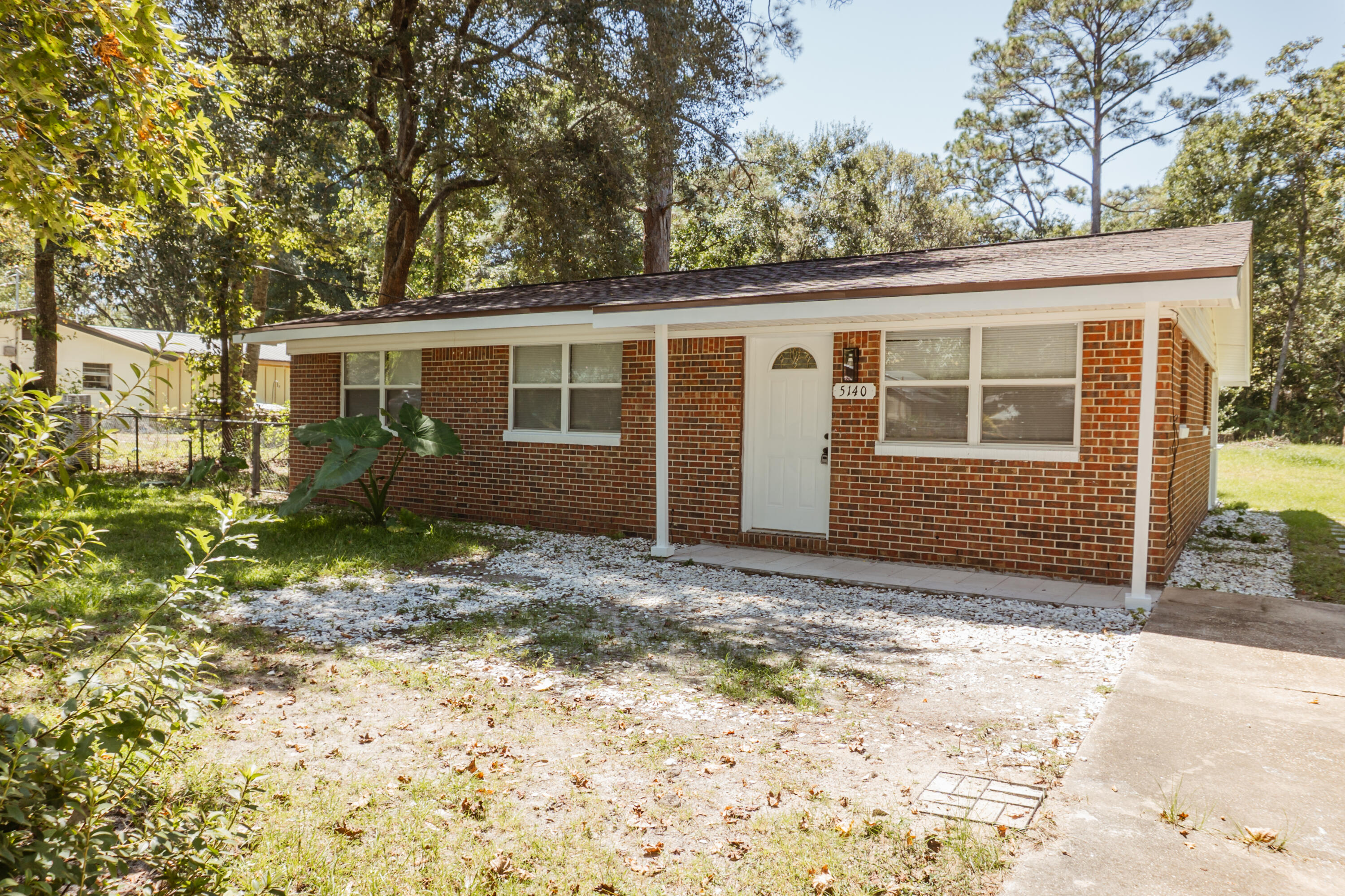 Available NOW! 3/1.5 in the center of Crestview! This great little house has been completely remodeled! New flooring, new fixtures, and new paint. Large corner lot with chain link fenced back yard and storage building. Just outside the city limits! Master bedroom has a half bath along with plenty of storage. Step outside in the LARGE backyard, perfect for entertaining! Laundry Room in the back of property. Pets may be allowed with owner approval and a $400 non-refundable pet fee! No Smoking in this property. Applications are done online at www.rentgoodlife.com