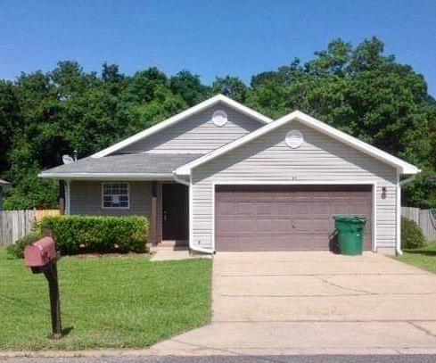 LOCATION! Quick access to Hurlburt AFB, Fort Walton Beach amenities, and the beaches! Well maintained 3 bedroom home. Solid surface flooring in main areas with carpeted bedrooms and tiled bathrooms. Living room features fireplace and vaulted ceilings. Double vanities in master bath. Covered back porch.