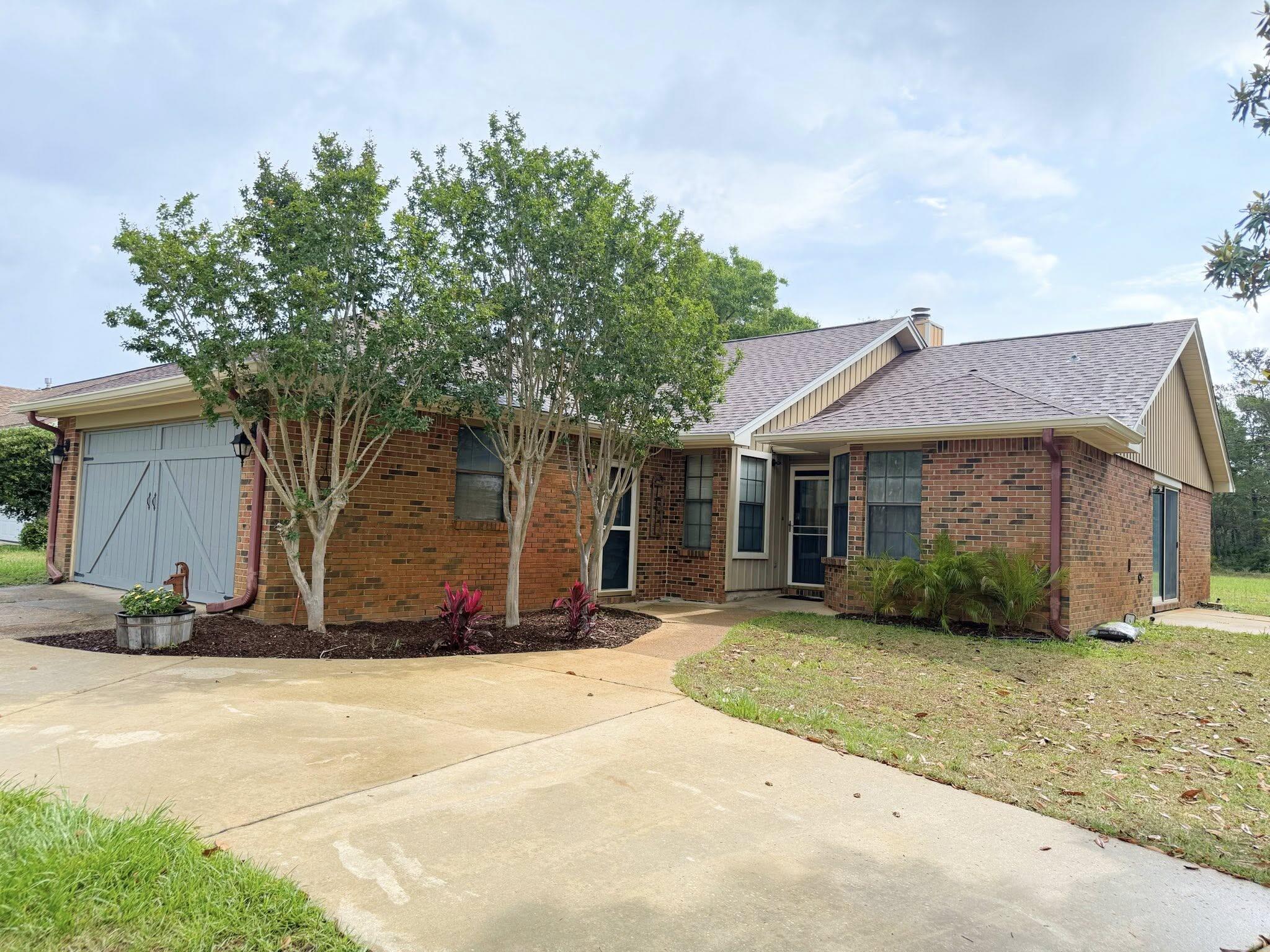Beautifully updated Mary Esther home backing up to the Eglin Reservation--no backyard neighbors! Located off Hwy 98 across from the water, near Navarre Beach, Hurlburt Field & top-rated schools. Features include LVP & tile throughout, remodeled kitchen, quartz countertops, white shaker cabinets, and updated bathrooms. Master bath offers a garden tub & walk-in shower. Large living & dining areas, big indoor laundry room! Garage converted into a private bonus bedroom. Spacious backyard with storage shed. Turn-key and move-in ready! HIGHLY motivated sellers!