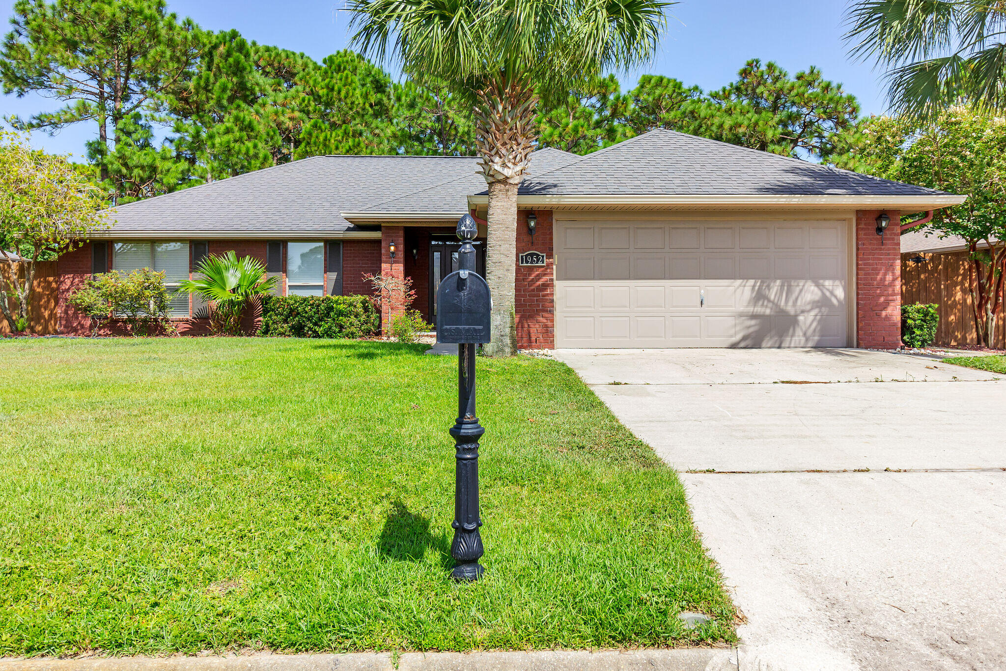 Hidden treasure! This 4-bedroom, 2 full baths in secluded Bay Pines subdivision. All brick with gutters/downspouts, and privacy fence on all sides. Back yard is 1/5 of an acre and beautiful!! Open kitchen with raised serving bar, stainless appliances with smooth top range and separate microwave. Interior finishes include knock down ceilings with vaulted ceiling with plant ledge in great room. Master bath features kitchen height cabinet with double sinks, garden tub, and separate shower.  **New carpet to be installed soon in 2 bedrooms **Shed in back for extra storage. This home has it all!Contact the office for showing today! 850-729-0399 or apply at rentwithbsr.com