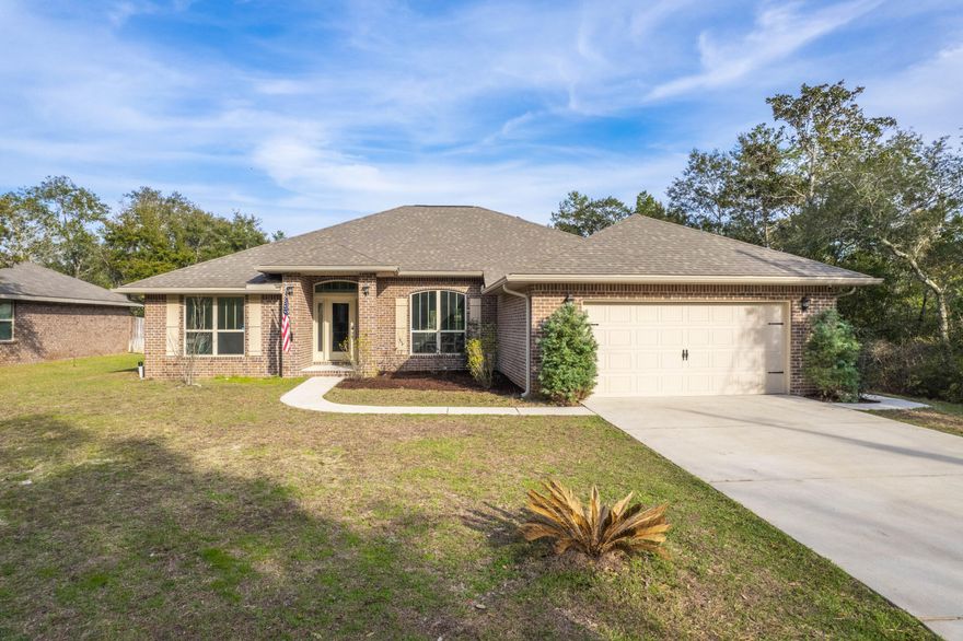 Under Contract with Kick Out Clause. Your 2017 all brick, split floor plan 4 bed / 3 bath home is waiting.When entering, note the open living space unified by the deep color of the wood-look LVP flooring throughout the den, dining and living rooms contrasting with the abundant natural light and raised ceilings.  The grandeur of the living space is highlighted with architectural and design accents like the finished columns and beams that frame the entryway, the two-panel curved-top beadboard doors to the bedrooms and laundry room, and the full lite front door and side lites.  At the rear of this open living space is the kitchen with a full granite-topped breakfast bar overlooking the breakfast nook and views of the backyard.