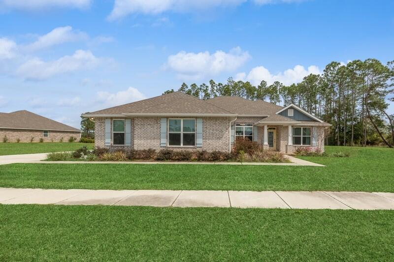 Welcome to this stunning nearly new home nestled within a picturesque golf course community, offering a lifestyle of luxury and leisure. This spacious 4-bedroom, 3-bathroom residence boasts exquisite craftsmanship and modern amenities, including access to a neighborhood pool for your enjoyment. Step inside to discover a bright and open floor plan, highlighted by luxury vinyl plank flooring that flows seamlessly throughout the home. The heart of the home is the gourmet kitchen, featuring premium appliances, granite countertops, and a large island, perfect for entertaining guests. The master bedroom is a true retreat, complete with a cozy sitting area Three additional bedrooms provide ample space for family and guests.