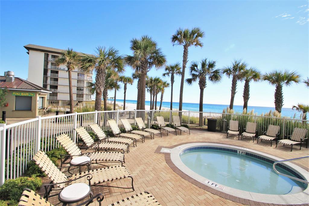 The most sought after property in all of Panama City Beach! The Grand Panama Beach Resort is centrally located in the heart of this beautiful city close to everything! This expansive East End investment or second home, will never have unobstructed views of the amazing sunrises and direct Gulf of Mexico views, will provide you with sunsets to remember! Located on the 18th floor this property is turn-key ready, and if looking for investment, look no further as it is rented through season and has great rental revenue! This unit has beautiful upgraded tile though out main areas and new carpet in all bedroom areas.