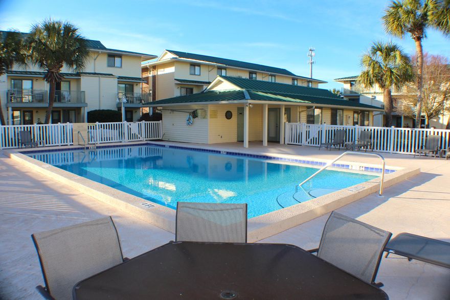 ONLY ONE BLOCK TO THE BEACH!!! There you will find sugar white sand and the clear waters of the Emerald Coast; you will also find Pompano Joes for dining and daily live music. Sandprints complex offers a pool and club house surrounded by a beautifully landscaped courtyard. This is a very well-kept condo with an open living and dining area, the kitchen offers a breakfast nook and a balcony overlooking the courtyard; the laundry and half bath complete the first floor. On the second floor you will find two bedrooms with their own private bathrooms and a balcony off the master bedroom. This is a spacious unit with approximately 1192 square feet and will accommodate six guests with the sleeper sofa. Currently priced at appraised value, seller is firm on price.