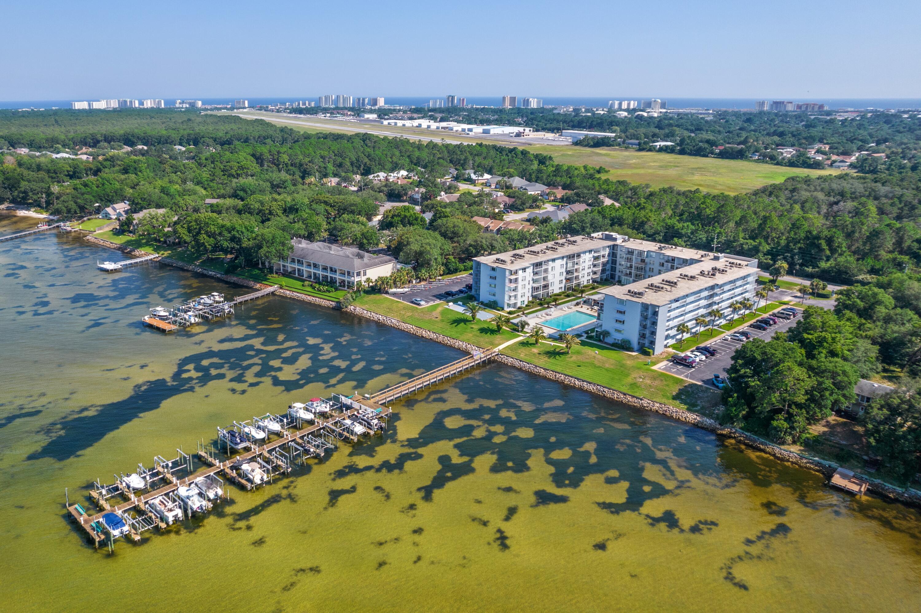 Destin living at its best!!! Nestled on the North side of Destin & overlooking the Choctawhatchee Bay, Century Park Villas, with its private marina, is hard to beat. 2023 remodel includes NEW LVP flooring & baseboards throughout, water heater, marble vanity top in master bath, blinds in bedroom & patio & freshly painted walls, trim & patio floor. This 4th floor 2-bed, 2 bath condo offers peaceful living with no short-term rentals (6 month min.) or pets. HOA amenities include large pool, club house (with pool table/ping pong table & darts, full kitchen/bathrooms), shuffleboard, fishing from the community dock with picnic area & fishing station, same floor laundry & storage room, & on-site Mngt Company. Be sure to check out the 360 Virtual Tour! Buyers to verify all posted information.