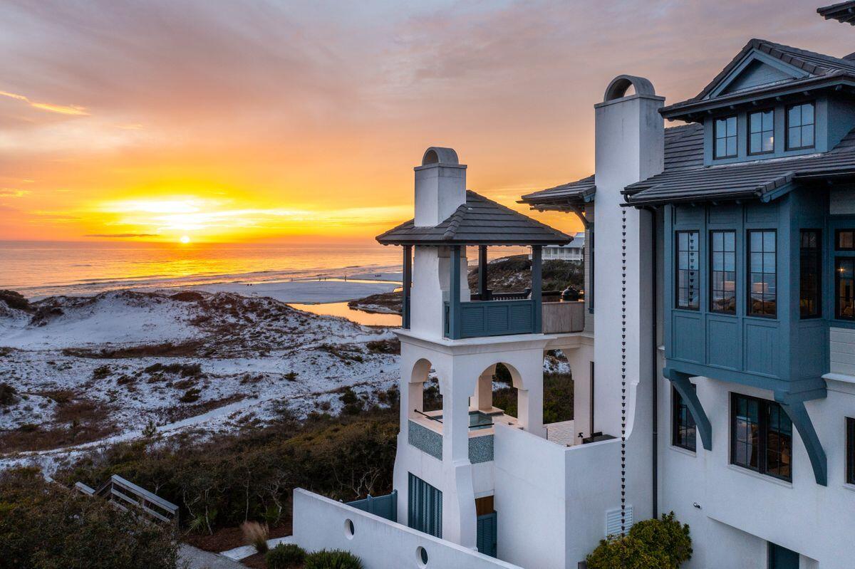 Perched atop rolling white sand dunes with limitless views of the Gulf of Mexico and Draper Lake outfall sits ''The Art of the Sea,'' a home unlike any other where design inspiration was drawn from the sea and finishes were purposefully selected to reflect a life well lived on the water. This 6,080-sq.-ft. like-new residence tucked inside the private, leafy community of The Retreat lacks for nothing with five bedrooms, a bunk room and six full and two half baths. Built in 2016, with architectural work by Archiscapes and construction by Gulfview Construction, this home is a masterclass in elegant living, from its nearly 2,000 square feet of covered porches to its one-of-a-kind infinity-edge pool and spa.