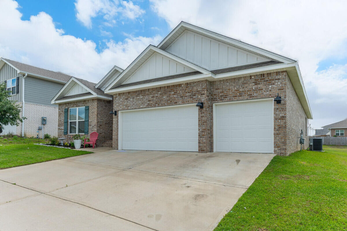 South Crestview Like New Home is ready for its new owners. Everything built in 2021 with a few upgrades. It's a must see!! All appliances are included such as high-end washer, dryer, fridge, stove, microwave and dishwasher! We have also included a smart system alarm and keyless entry. You are all set!! The 3-car garage is great for both cars and a toy or two! You could also transition it into a gym similar to the previous owners! It's on a cul-de-sac so perfect for everyone including pets! High rated schools are within miles; this is the Destin plan so highly spoken of but better in one of the most highly sought after neighborhoods in Crestview due to it's location.Schedule your walk through today! This house and neighborhood just feels like home...