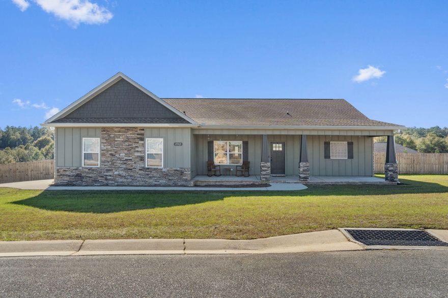 Welcome to this exquisite home offering modern living in a tranquil setting on a sprawling 1/2 acre corner lot. This home is a true gem, w/stunning stacked stone electric fireplace, creating a warm, inviting ambiance. It features crown molding & recessed lighting w/9' ceilings throughout, enhancing the spacious feel. Delight in the durable and stylish wood plank tile flooring. A separate office/den, equipped with stylish barn doors, provides a private workspace. The gourmet kitchen boasts sleek granite counters & stainless appliances, perfect for culinary adventures. The large master suite is a haven of relaxation featuring a double vanity, deep soaking tub, and tile shower. French doors lead to the covered lanai, offering serene outdoor enjoyment & ideal for leisure and entertaining!