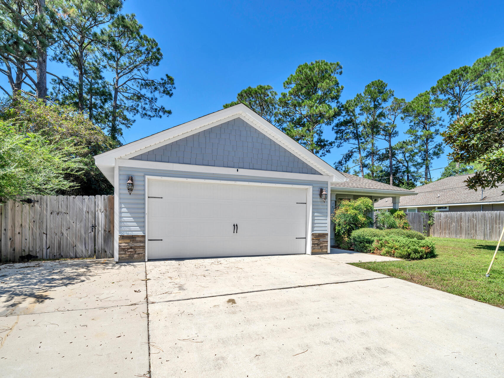 Newer built home with 3 bedrooms, 2 baths and LOTS of upgrades to include an additional parking pad perfect for a boat, RV, trailers, or jet skis. Huge yard that includes gutters, covered rear patio, and a double gate leading into the large backyard. Interior upgrades include hardwood flooring, soft close drawers, blinds throughout, granite counter tops in kitchen, double vanity in the master bathroom with soaking tub, separate shower, and master bedroom his and hers closets with a separate commode room! Open concept kitchen that flows directly into the living and dining space with canned lighting.Extremely quiet and private street, in close proximity to all that the Emerald Coast has to offer - white sand beaches, both Air Force Bases (Hurlburt and Eglin), Pensacola, Destin, and more