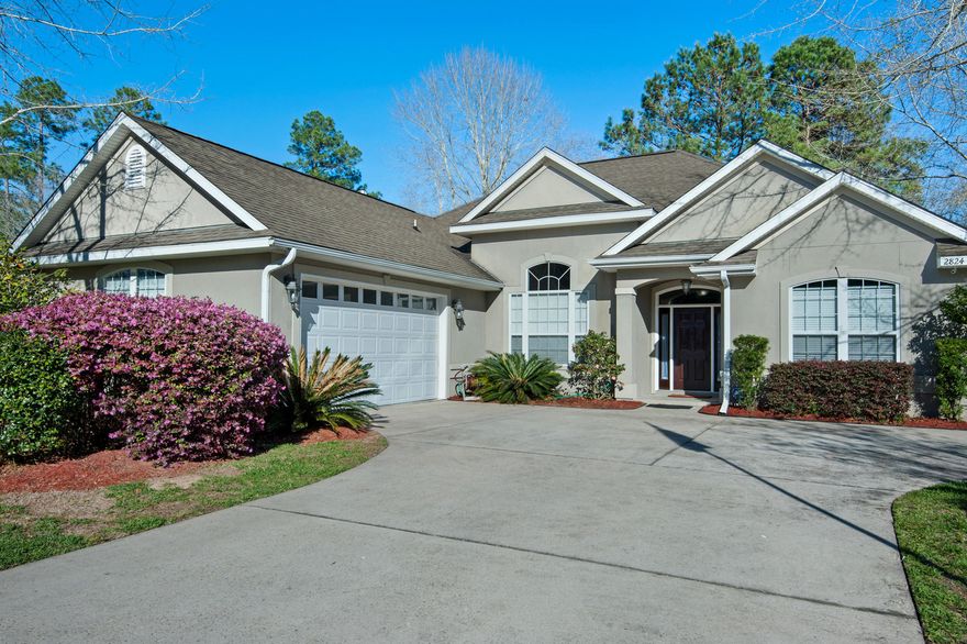 PARADE OF HOMES NOMINEE AND MODEL HOME, NOW AVAILABLE, IN EXCLUSIVE CLAIRE'S VINEYARD! This gated community was designed to be a hidden oasis, surrounded by English-style gardens and lush greenery. Residents can experience peace and serenity, though only minutes away from everything Crestview has to offer. This 4 BR/3 bath Mediterranean-style home is loaded with upgrades and sits on a premium lot, bordered by designated green-space. AS A BONUS.. the owners are including a ''Home Protection Plan'', with American Home Shield, for one year. The home features 9 foot ceilings, with upgraded moldings and trim, a premium lighting package (inside and out), pocket doors, and a screened in back porch overlooking the gardens and brand new pergola. The homeowners recently made a $20,000 investment!