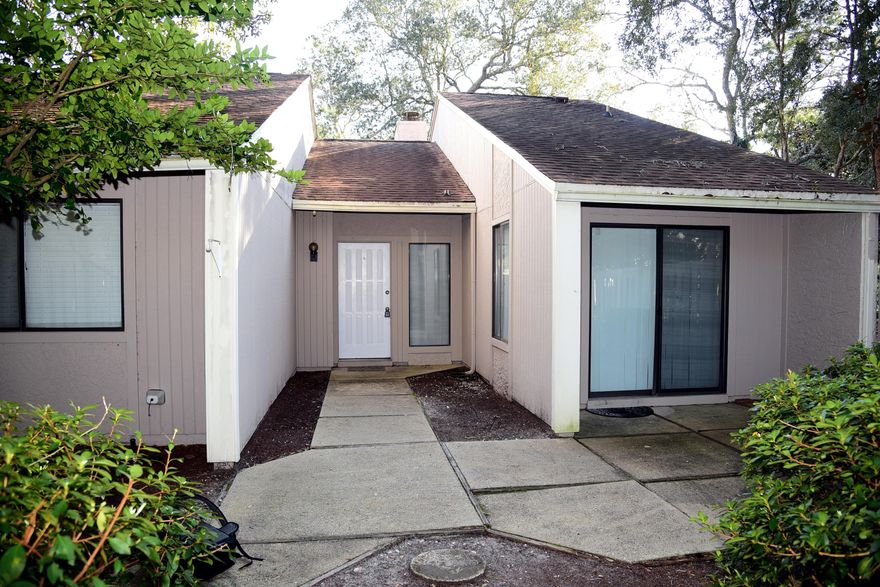 Highly sought after patio home in Bluewater Bay! The kitchen has a breakfast bar and opens to a breakfast area with sliding door to the enclosed patio. Master bedroom features an adjoining master bath, walk in closet and sliding door to another private patio.  Enjoy the wood burning fireplace in living room. HOA maintains property outside the patio area. Are you looking for low-maintenance living?  Call to schedule your appointment today!