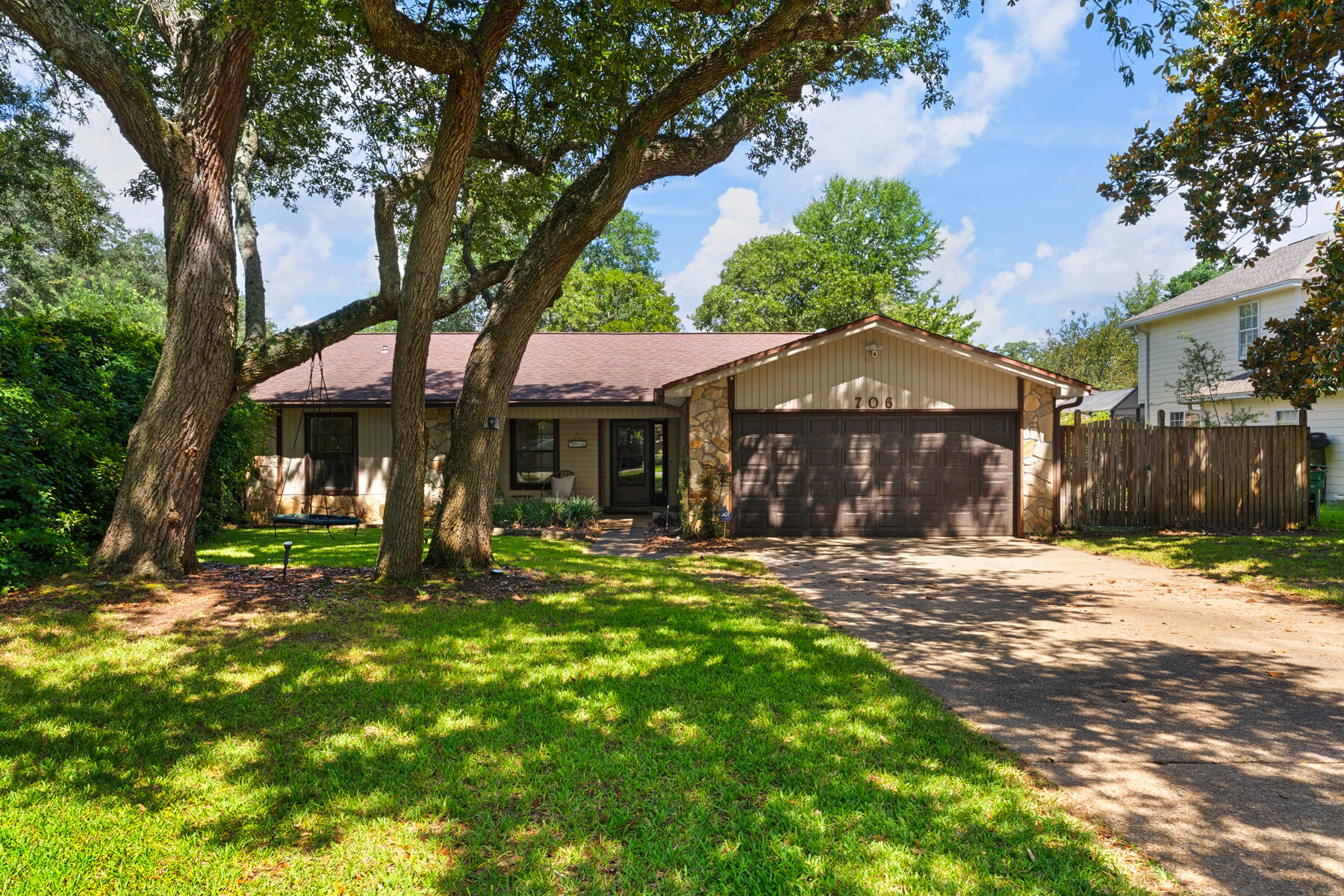Location, convenience and ease of living! Bluewater Bay has it all. If a neighborhood that promotes the Florida lifestyle is what you are hoping to find - this could be ''The One''. Located on a beautiful street with other well maintained homes - 706 Providence Way offers great living spaces, nice-sized bedrooms, an updated kitchen, huge backyard...and it's all on a beautiful shaded lot. The oversized living area and a 200 sqft heated and cooled Florida room will accommodate your family as will the big back yard. Let's don't forget to mention the expanded patio for grilling, the storage shed in the back, additional storage cabinets in the garage and an automated sprinkler system! Items of note: Roof 2012, HVAC 2024, Water Heater 2020, Termite Bond with Florida Pest Control.