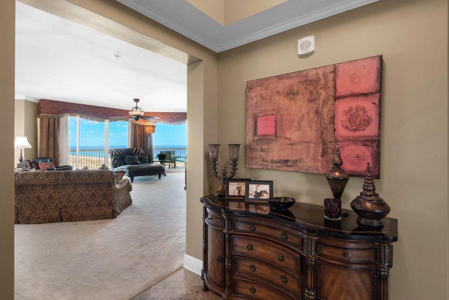 This 3 bedroom/3 -1/2 bath condo with 2 large terraces is bordered by Henderson Beach State Park providing endless gulf views to the East. The living & dining area is huge with a wall of windows. The kitchen with granite counter tops has loads of cabinet and counter space along with a lovely breakfast room looking over the resort all the way to the Choctawhatchee Bay. The master bedroom suite is perfectly positioned for viewing spectacular sunrises over the Gulf of Mexico. There are two large closets and the bathroom has 2 vanities, a Jacuzzi tub and a walk-in shower. The 2 guest bedrooms have in suite baths and there is an additional powder room located off the foyer. (con'd)