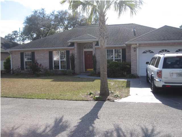 Lovely updated home in gated Community of Parkwood Estates. Walk to Elementary school. Easy walk to Merchant Walk shopping center. Home has Tile and Pergo floors with carpet in Bedrooms. Split bedroom plan with fourth bedroom up front. Fourth bedroom could be office or den. Good size Family room with Gas Fireplace. Very nice Dining area, Spacious Kitchen with all Stainless steel appliances and Granite Counter Tops, Smooth Top stove. Master Bedroom with large Master Bath, separate Shower, Jacuzzi Tub. Walk In Closets. Other bedrooms are good size and share full bath. Doors from Family room open to Screen Porch that is tiled. Porch overlooks well kept Fenced backyard with very nice size Lanai for Barbeque and enjoying the yard. Lawn Pump with Sprinkler system. NON SMOKING UNIT.SMALL
