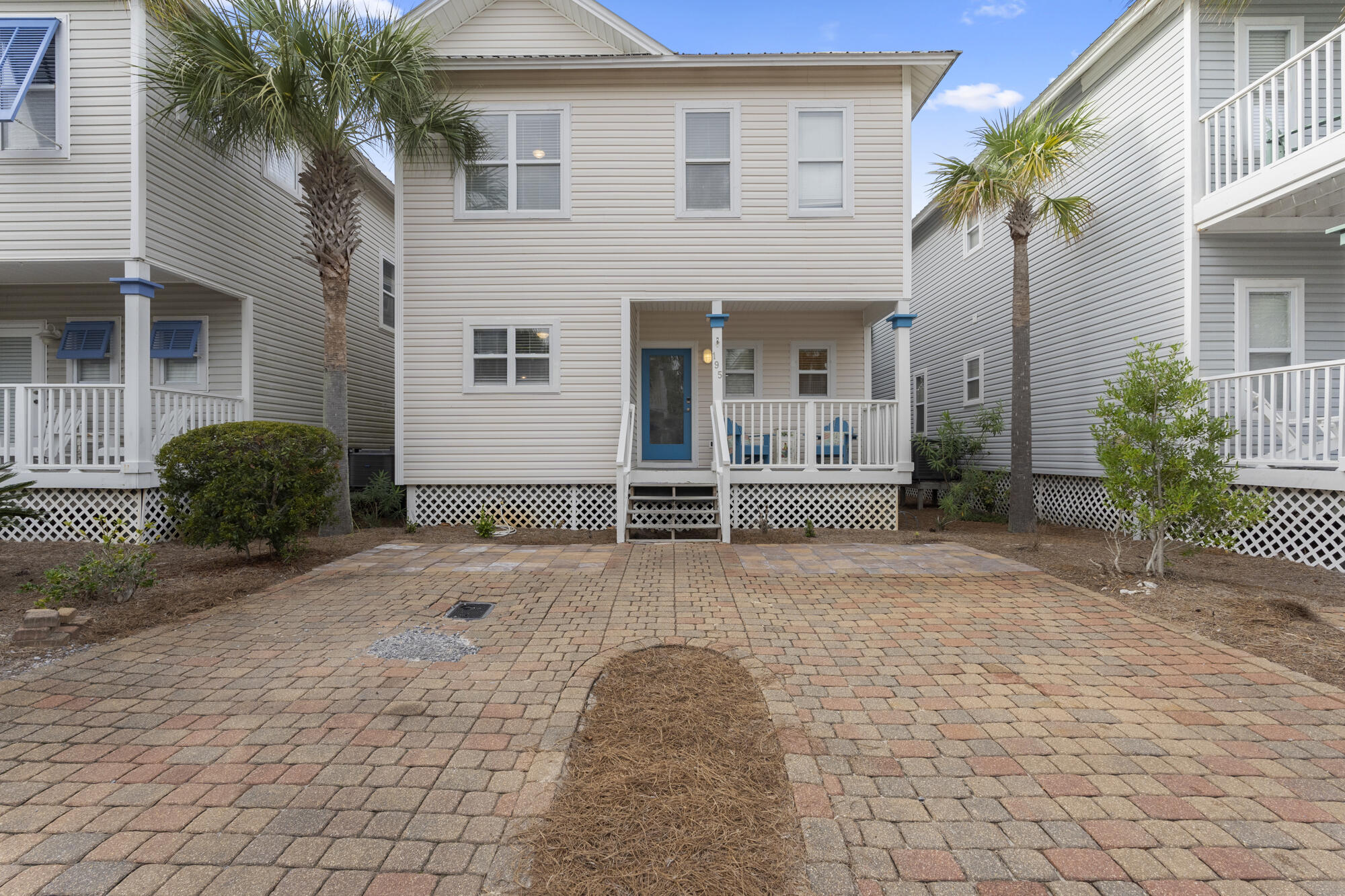 Discover this charming 3-bedroom, 2.5-bathroom beach cottage nestled just south of 30A in the highly coveted Old Florida Cottages community. A mere 4-minute walk takes you to the public beach access, where you can revel in the Gulf's white sandy beaches and emerald green waters. Enjoy dining, shopping, and entertainment just a short stroll away at Gulf Place.Step inside the first floor to an inviting open floor plan, featuring an oversized breakfast bar, perfect for family gatherings and entertainment. Embrace the quintessential Florida lifestyle with Bahama shutters, two porches, and a balcony overlooking the community pool. Upstairs, find three bedrooms and two bathrooms, providing privacy from the main living area. The primary bedroom offers an en-suite bathroom with a double vanity and separate shower, ensuring a serene retreat. Don't miss this opportunity to own a piece of paradise in a prime location!