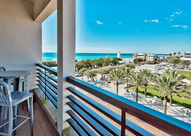 A VERY RARE FIND in Seaside! This wonderful retreat, located in the Dreamland Heights building, overlooks Seaside's bustling Central Square and Amphitheater and captures gorgeous views of the Gulf of Mexico. As you enter the unit you come upon a large Master bedroom that has custom cabinetry, designer draperies and an ensuite bath with spa tub. You then take a winding staircase to the 2nd level and enter the large great room. Here you have a barrel-vaulted ceiling, custom draperies, and high-end furnishings. You can also enjoy spectacular sunsets from the private balcony just off of the great room. This unit has been updated with Venetian plaster throughout, beautiful wood floors, updated windows and doors and new appliances. It is being sold ''turn-key'' and rental ready!