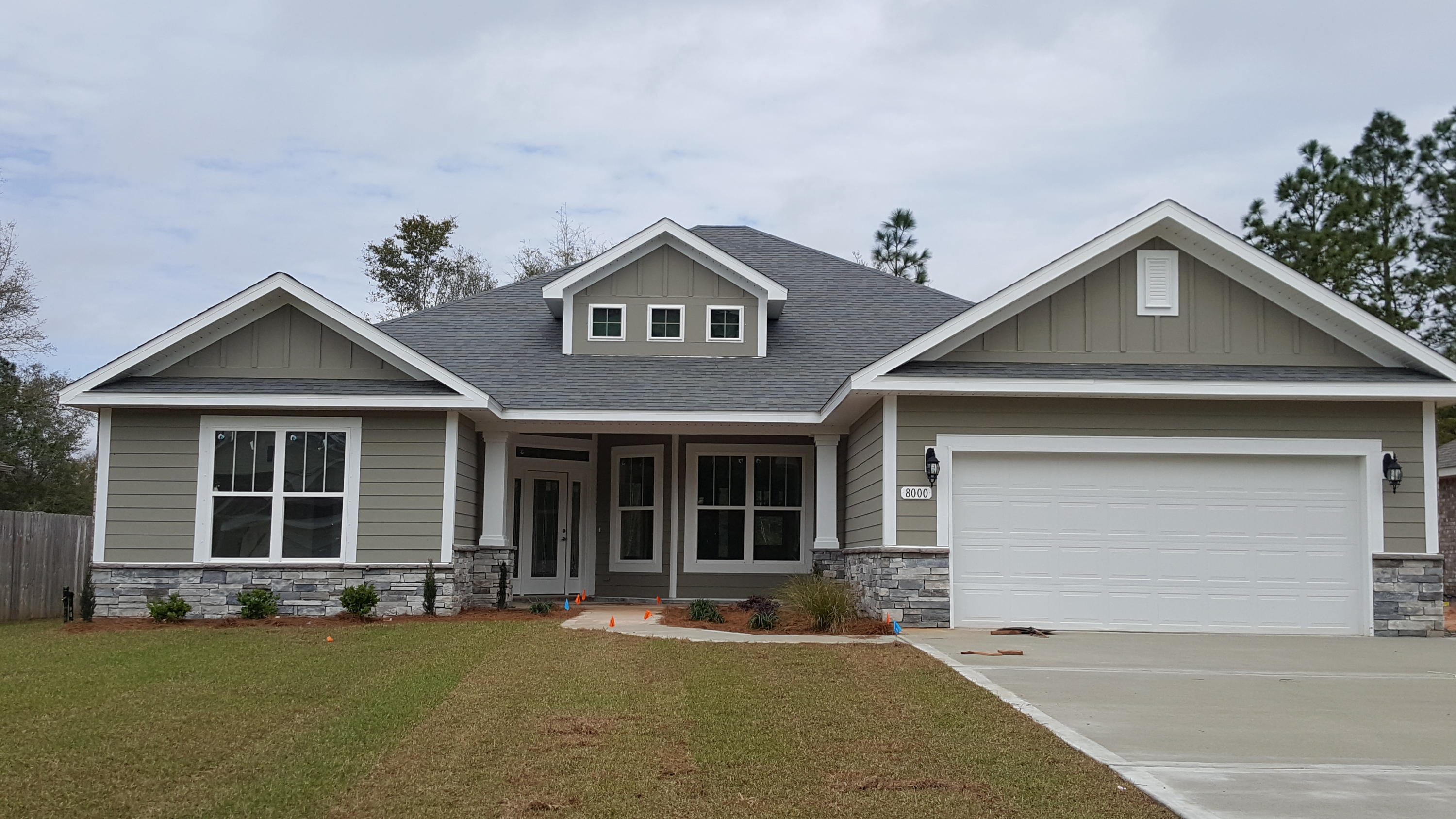 NEW BUILD IN THE PRESERVE IN MILTON! CLOSING COSTS PAID BY THE BUILDER USING ONE OF FIVE PREFERRED LENDERS-Wide open floor plan with 9 foot ceilings-stainless steel appliances and granite counter tops in kitchen-covered front porch and lanai-large master suite with dual vanities, garden tub and separate shower-ceiling fans -low E tilt in windows for easy cleaning--sodded front, side and back yards with sprinkler system featuring Rain Bird sensor and automatic timer-half acre lot. The Preserve is convenient to I10, less than 30 minutes to Navarre Beaches, downtown Pensacola and the Cordova Mall. All lots in The Preserve are on public water and sewer, NO SEPTIC TANKS, and there is plenty of room in the back yard to put a pool, shed or workshop or to store your RV, boat and other toys. Co