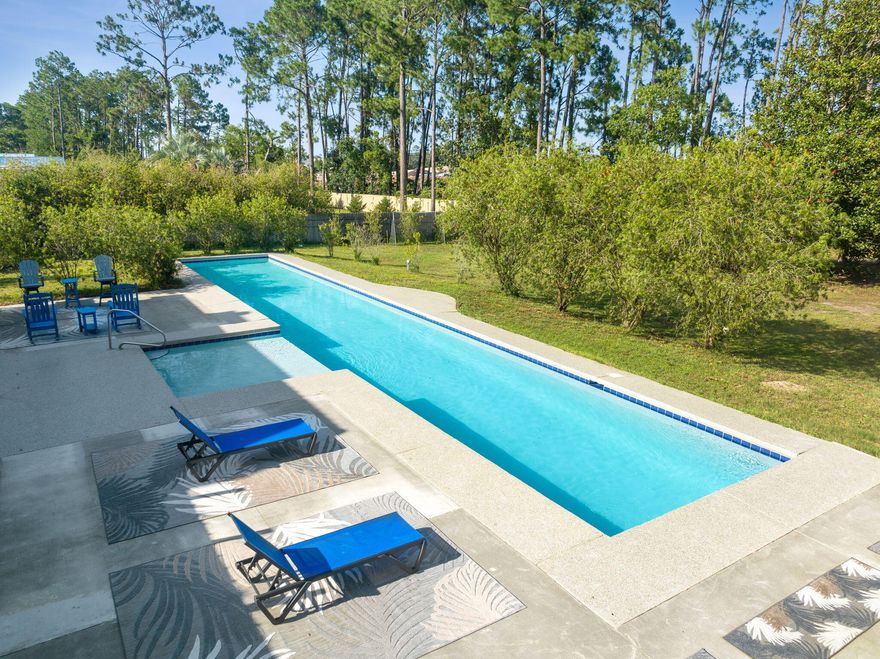 Escape to your own private paradise with this expansive estate boasting an array of luxurious features and ample space for relaxation, recreation, and entertainment. Situated on over an acre of land, this property offers unparalleled privacy and freedom, free from the constraints of an HOA.**Key Features**:**Generous Bedrooms**: With 6 bedrooms, including a lavish master suite, this home provides plenty of space for family and guests to unwind in comfort and style.**Massive Pool and Patio**: Immerse yourself in luxury with a sprawling pool surrounded by a vast patio area, perfect for soaking up the sun, hosting poolside gatherings, or enjoying evening cocktails under the stars.