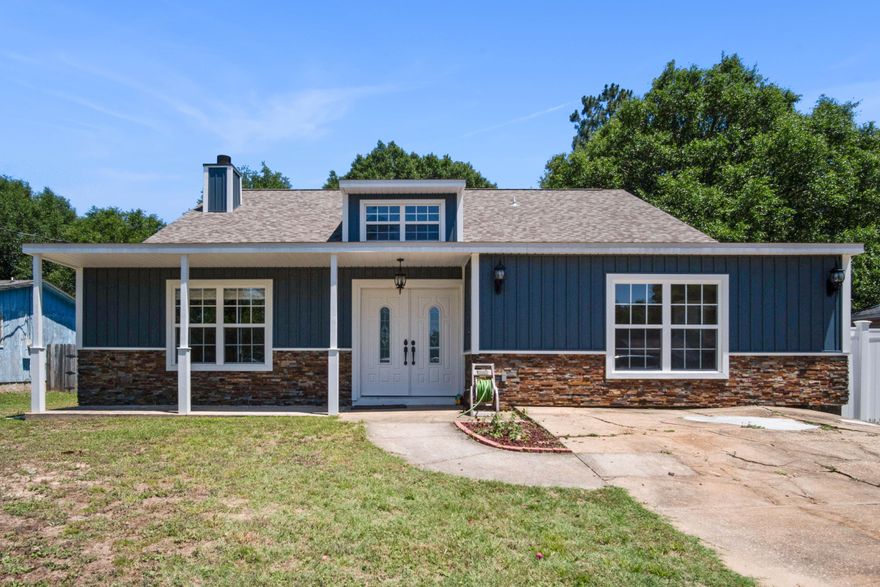 PRICE IMPROVEMENT!!!  You will love the feel and flow of this beautiful, completely remodeled, 4 bedroom home. Not only has it been redone with great finishes, but it has been done with longevity in mind. New roof, siding, windows, paint, and exterior doors in 2019, new balcony 2020, and a new HVAC in 2015. The home has no carpet and has been upgraded with luxury vinyl plank and tile throughout. You will be warmed and welcomed to the home upon entering with high ceilings and a fireplace! Around the corner is the dining areas and updated kitchen with granite counter tops and stainless steel appliances; including a brand new refrigerator. The bathrooms have been tastefully renovated with tiled showers and updated vanities and fixtures. NO HOA You will love the bonus space off the kitchen with a very oversized laundry room/storage area. There is also a beautiful back porch area with a balcony that runs full length and a large back yard with plenty of room for a pool and shed equipped with electricity. Make this house your home today!