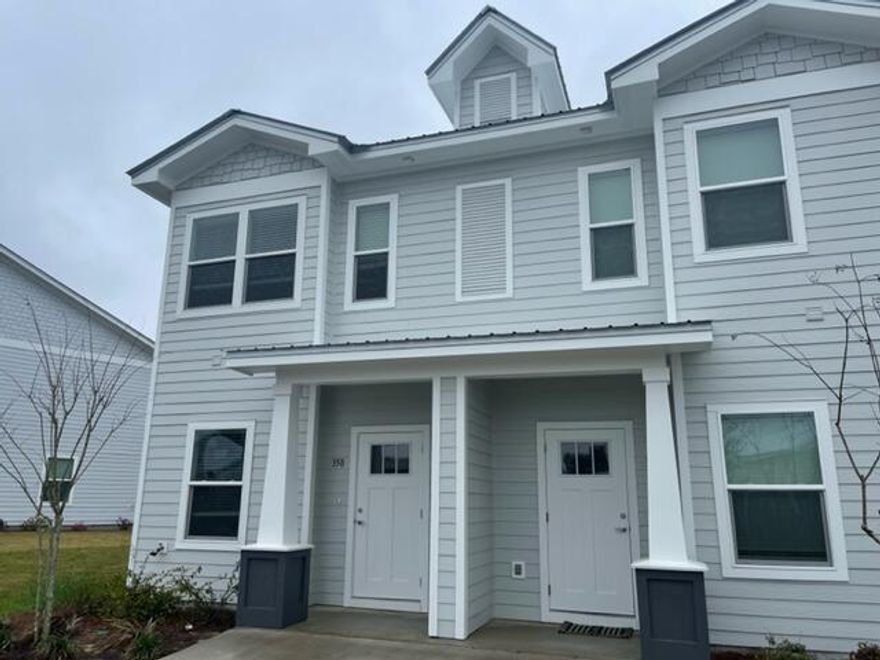 3 bedroom, 2.5 bath end unit town home with upgrades and a community pool! This lovely home is across the street from an elementary school, just down the road from a Publix shopping center, and a short, easy commute to the sugar sand beaches and emerald waters of 30a/SOWAL. It has fresh, neutral paint throughout, and beautiful LVP downstairs. The open floor plan on the first level includes a nice size living room with nook, eat-in kitchen with breakfast bar, gorgeous counter tops, plenty of counter/cabinet space, & stainless appliances (including a flat cook top stove), as well as a half guest bath with pedestal sink, & there is a screened-in back porch coming, as well. 

Upstairs, you will find the master bedroom, complete with a walk-in closet and en suite, as