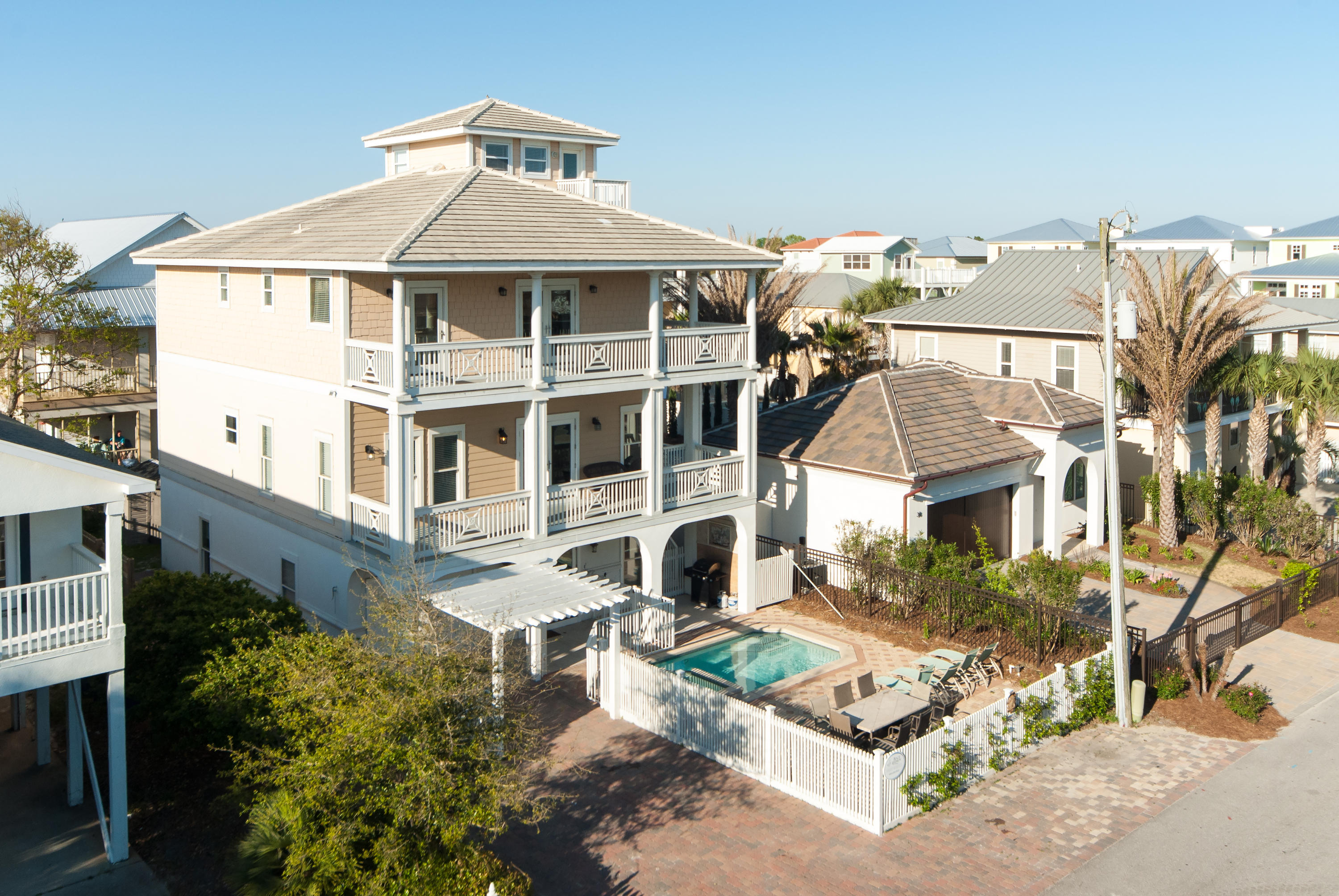 Large beach house, with gulf views and just steps to the beach, in the popular community of Frangista Beach. The four level, eight bedroom home comfortably sleeps 22 people allowing ample space for everyone to enjoy.The den, located on the first floor, sits just off the pool deck. It includes a pool table, built in wet bar and washer/dryer. Off the den is a large media,two guest bedrooms and bathroom with stand up/glass shower.The second floor of the home includes the main living space with two guest suites. The large living area homes two dining tables, travertine floors, granite counters with bar seating, two dishwashers,dual built-in ovens a large living area and windows with glass doors running along the south side of the home