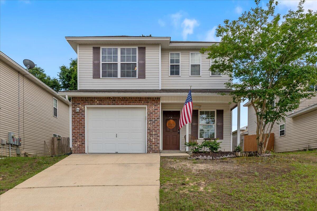 Welcome to 291 Dahlquist Drive - the perfect blend of comfort, style, and convenience in the heart of Crestview! This 3-bedroom, 2.5-bath home offers an open, split floor plan with generous living spaces and modern finishes throughout. Enjoy a beautiful kitchen that has ample cabinet space and a spacious breakfast bar that opens to the living and dining areas - perfect for entertaining. The large master suite boasts a walk-in closet and en-suite bath with double vanities. Outside, relax on the open patio overlooking a fully fenced backyard, ideal for kids, pets, or weekend BBQs. Located in a quiet, established neighborhood with easy access to military bases, shopping, and schools. This move-in ready home won't last long - schedule your showing today!