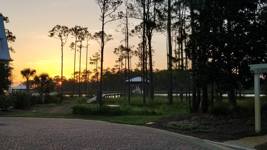 Under contract with a 72-hour kick out, SO LETS WRITE UP AN OFFER!Just up the street from the beach is this wonderful waterfront lot in a quiet gated community. Build your dream home on the water and put a boat dock and call it Heaven!Selling agent has interest in the property