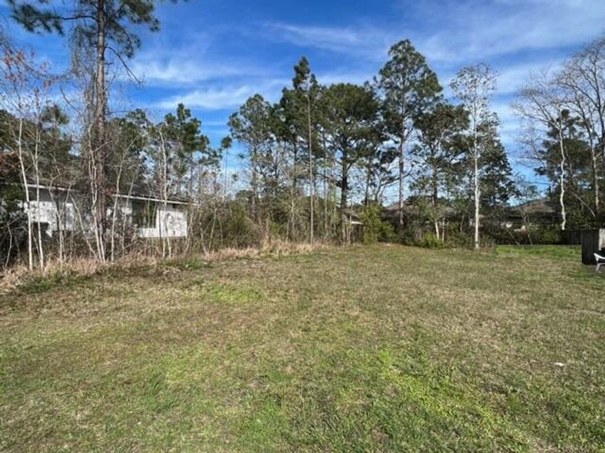Cleared Lot, Ready for Your New Home!  No Homeowners Association!  Conveniently located close to Beaches, Bases & Shopping!  Less than 3 miles to Navarre Beach, 8 Miles to Hurlburt Field, Close to the new Publix & a few blocks  from Super Walmart! This is a perfect lot for your new home!   Located in Flood Zone X (no flood insurance required!) and no known wetlands.  There IS a drainage easement on the lot but the lot is larger than most on the street and as far as the seller is aware, it is not considered wetlands.  A survey is available & Public Sewer is available.  There are some mobile home on the street and this lot may qualify for a mobile home also.  A beautiful new single Family Home was recently built next door.  Buyers' please verify the information that is important to you.