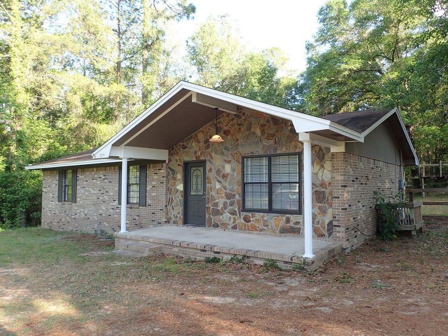 Don't let this one pass you by! Built in 1984, this 3 bedroom 1 and 1/2 home has all brick exterior, partially fence back yard and rests on 1 acre. Just minutes from the heart of Defuniak Springs and the interstate, this move in ready home is a must see! Home has fresh paint, tile in all areas other than bedrooms, updated fixtures, new water heater and time, recently installed appliances and lots of character. A must see! Call today!