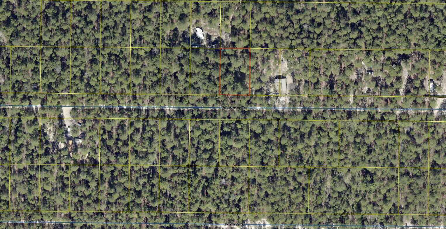 one lot of 4 platted lots adjoining each other in Unit 2 of Oakwood Hills, an area which is currently being developed and growing. Numerous distribution centers under development, such as Amazon. Zoning is Rural Residential which allows Single family residential, According to March 30, 1976 Declaration of Restrictions, No mobile homes shall be erected on any of the lots in Oakwood Hills, Unit 2. See documents.  See photos for information PER the COUNTY GIS map for soils, flood zone , which is X, zoning, and other pertinent info. Set backs per county F 20 B 15 Sides 7 1/2 . The lot is raw , no tap in fees have been paid, septic needed.