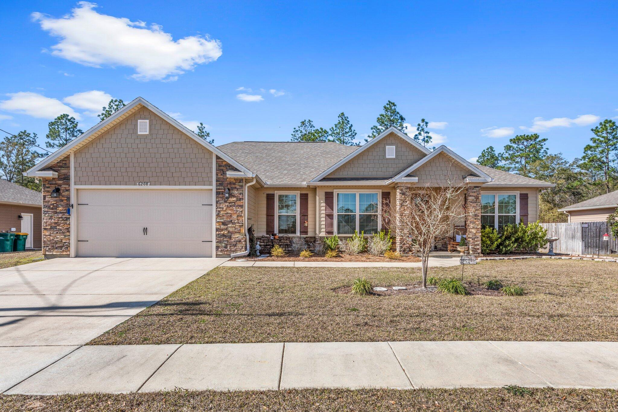 Come check out this beautiful and very well maintained custom built home in Timberland Ridge Subdivision. This newer home features 4 bedrooms, 2 bathrooms, 2 car garage and is situated on a larger flat lot. There's a beautiful stone fireplace in the living room, high ceilings and an open concept living/dining/kitchen area that makes this a great place for the family to gather. The kitchen features all stainless-steel appliances, subway tile backsplash and oversized pantry. Off the kitchen is the laundry room with a built-in sink. The master bedroom is very large, and the master bathroom features a walk-in shower, garden tub, double sinks, and an additional separate vanity area for even more storage. The other 3 bedrooms are plenty big to accommodate everyone. Scheduling a showing today.