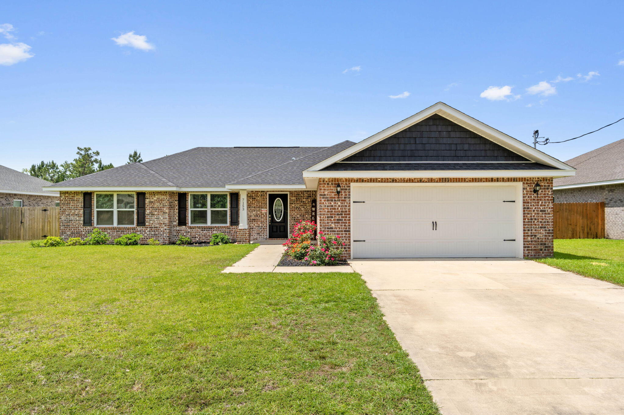 Built in 2020, this 4-bedroom, 2-bathroom home offers energy efficiency, quality construction, and thoughtful upgrades--all just minutes from Navarre's white-sand beaches.Step inside to discover an open, light-filled floor plan enhanced by LVP flooring, neutral paint tones, and granite countertops throughout. The spacious living area flows seamlessly into the kitchen and dining spaces, perfect for family gatherings or effortless entertaining.Enjoy evenings on your screened-in patio, perfect for relaxing without the bugs. A fenced in backyard provides privacy, while a shed adds valuable storage.This home also comes equipped with solar panels that will be fully paid off at closing by the seller, providing long-term energy savings and eco-conscious living.