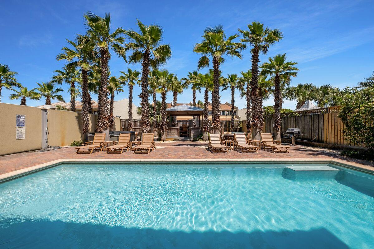 ''The Silver Peso'' is a five bedroom beachside retreat, just over 3,300 sq ft of living space, located in the well established community of Frangista Beach. A top producing home with over $215,000+ of rental income on the books YTD 2021. 62 Miami Street conveys fully furnished and has been beautiful decorated with coastal decor and furnishings throughout. Notable features include multiple living spaces, tile flooring throughout, two car garage, two bunk rooms, tons of outdoor and balcony space and a true backyard oasis with a large private pool, palm trees, ample privacy, beautiful landscaping, outdoor shower, plenty of space to relax, hot tub, a tiki hut and BBQ area.