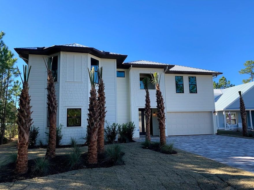 Construction completed in four weeks.   This is your chance to own a custom five bedroom house with no detail left to chance.  This house is located within the gates of Cypress Breeze.  This beautiful two story home features upgrades including tile flooring throughout the bottom floor, oversize kitchen with custom cabinets, quartz countertop, stainless steel appliances and a large custom built pantry.  The kitchen overlooks the dining area and living area.  The living area leads to the outside covered area perfect for family and friend cookouts.  Also from the dining area you will notice the large foyer area with the custom designed staircase to the second floor and to the right of the living area you will find a half bath and steps away you are in the first floor master