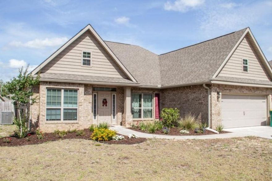 Beautiful 3 bedroom 2 bath home brick home with an office/flex/family room off of the foyer across from the formal dining room. The spacious kitchen is open to the main living area. Granite countertops, island. Open concept anyone? The bedrooms are split with the master on one side of the home and the two remaining bedrooms and guest bath on the other. The covered patio is perfect for relaxing or entertaining in the privacy fenced backyard.