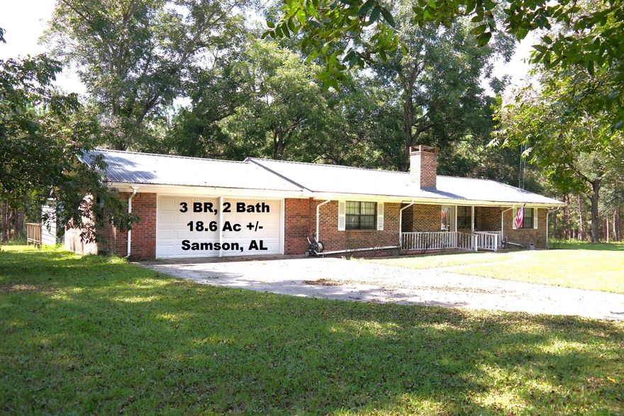 Great buy on this 3 BR, 2 bath brick home on apx 18 ac in Samson. AL. Beautiful mix of mature trees, including 13 pecan and apx. 10 ac planted pines through USDA CRP program. Interior features include wood burning fireplace w/ blower; solid surface countertops in kitchen, split BR floor plan, office/den area. A 1995 addition includes FL room & a bonus area that can be accessed from inside the home or from the garage. Home is under a current termite bond through Orkin. City water, septic (last pumped & new drain field in 2020). There are some wetland areas in the NW section of property & a deer blind set up in the SW corner, making for great hunting. This property is apx. 6 mi. N of the FL line; 40 min. from Andalusia; a little over an hour to the beaches of S Walton. This is a must see!!