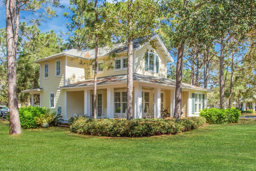 Recently renovated cottage tucked away on a dead-end street within the popular neighborhood of Laurel Grove. Beautiful pine wood flooring flows throughout the kitchen and living with brand new carpet in the bedrooms. Updates include: new paint interior, pressure washed exterior, exterior paint 2018, new hot water heater, and new leathered granite in the bathrooms. The kitchen has been transformed with all new leather granite, white painted cabinets, tile backsplash, sink, GE stove & refrigerator, light fixtures, separate ice maker, bar stools and a new dining table. Enjoy two bedrooms with ensuites on the first floor with an additional bedroom with double bunk beds, walk-in closet and full bath on the 2nd. Relax and enjoy the well manicured landscaping on either of the 2 covered verandas.