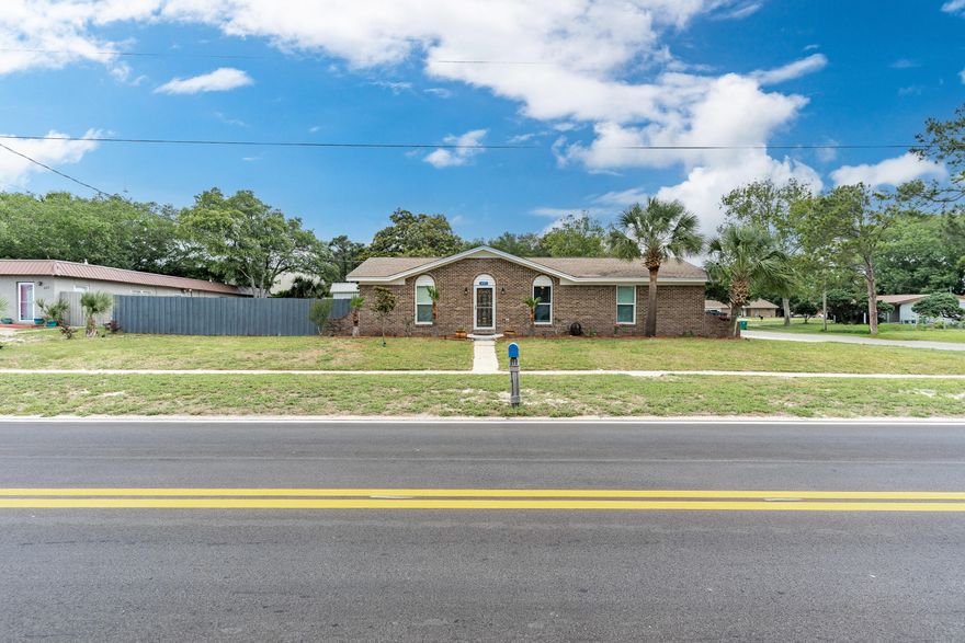 Fully remodeled 3-bedroom, 2-bath home with a 2-car garage, boat/RV parking, and located on a desirable corner lot in the heart of Destin. Renovated from the studs up, this home features brand-new electrical wiring and fixtures, fresh drywall, hurricane-rated windows, stylish new flooring, custom cabinetry, granite countertops, a tile backsplash, and sleek stainless steel appliances. Both bathrooms have been completely updated, with the master suite showcasing laminate flooring and an upgraded bathroom featuring a modern vanity and a tiled walk-in shower.Perfect for those who enjoy outdoor living, the spacious backyard includes a fire pit seating area, an outbuilding/shed with electricity, and a large open area ideal for adding a future pool. Conveniently located within walking distance to some of Destin's best, you can start your morning with coffee at East Pass Coffee and end the day with dinner and waterfront views at Boshamps Seafood & Oyster House. This home offers the perfect blend of comfort, style, and coastal lifestyle.

New roof to be installed prior to closing with acceptable offer! 

ASSUMABLE INTEREST RATE AVAILABLE AT A 2.75%!