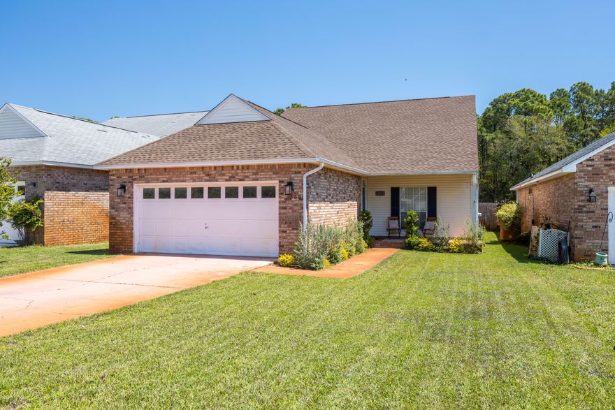 Welcome to this beautifully maintained 3-bedroom, 2-bath single-level home in the Bay Colony neighborhood within the Tiger Point subdivision of Gulf Breeze, Florida. Bring ALL your toys--this unique property offers abundant storage for your boat, RV/motorhome, camper, jet skis, golf cart, kayak, and more. Skip the storage facility--there's a private rear driveway leading to a 42'x21' spacious pole barn/carport equipped with full RV hookups and power, making it perfect for adventure seekers and outdoor enthusiasts.This home offers peace of mind with major updates including a new roof in 2023, brand-new HVAC system in 2024, and a new lawn sprinkler system and pump installed in 2024. Inside, you'll find elegant crown molding throughout, a modern kitchen with granite counters, stainless steel appliances, and a wine cooler, ideal for entertaining. The living room opens into a cozy family room, leading out to a paver-lined backyard patio, perfect for relaxing or hosting guests. A charming covered front porch adds extra curb appeal and a welcoming touch.

Located just 0.1 mile from the Soundside Foundation Nature Preserve path and 1.2 miles from the Tiger Point Sports Complex, you'll enjoy easy access to trails, ball fields, playgrounds, and community events. This property offers freedom and flexibility to fully enjoy your coastal lifestyle.

Don't miss your chance to own a move-in-ready home with room for everything, and everyone you love.