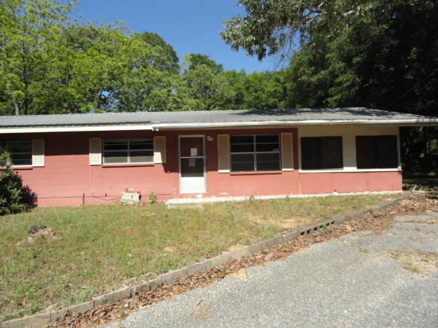 REO: This great little fixer upper is waiting to be loved.The block 3/2 home has a metal roof for lower insurance rates. The floor plan has 2 living areas and 2 full baths. There is an outside laundry room off the enclosed porch. The enclosed porch could be easily converted back to a carport.See attachment for PAS requirements and WFHM offer submittal information in MLS document section.