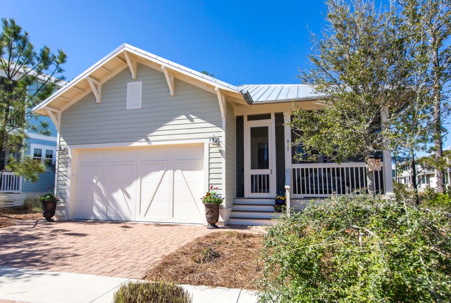 NATUREWALK in Seagrove Beach...beautiful home has never been on the rental market. This 3 bedroom, 2.5 bath Beachwind plan is on one of the larger cottage home sites backing to preserve and has pond views. The floorplan features a large family room with fireplace and opens to a beautiful kitchen with breakfast bar. The kitchen finishes include Shrock quality cabinets with soft close drawers, granite countertops, tile backspash, stainless steel appliances including gas cooktop and GE monogram hood. The spacious master suite has tray ceilings, huge walk-in closet off the master bath, and glass walk-in tiled shower. You will love the screened in front porch and back porch which offers lots of privacy overlooking the preserve area and pond. Some of the many upgrades include: