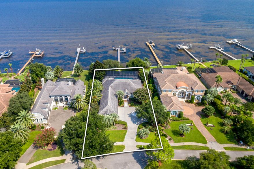 A peaceful waterfront lifestyleor a whirlwind of entertaining, pool parties and watersportsthis spacious, one-story home in a highly desirable Kelly Plantation location offers both!
Upon opening the door, you are greeted with the relaxing water views that complement so much of this home. The living area, which adjoins the formal dining room, faces the huge patio, pool and the beauty of the Choctawhatchee Bay, as does the kitchen, large family room and the sitting room of the master suite. High ceilings, crown molding and large windows enhance the feeling of spaciousness: whether you've gathered a houseful or want time alone, this well-planned property gives you room to breathe!
 
The kitchen features granite countertops; custom cabinetry with matching Subzero fridge; stainless Kenmore Elite oven, microwave and dishwasher; contemporary glass and tile backsplash; attractive pendant lights; breakfast bar; pantry closet; and extra bar area near the dining room. For cozy evenings, both the family room and the master suite have gas fireplaces. 

The master bath includes his-and-hers closets, dual sinks/vanities, a jetted tub and separate shower with dual heads and seat. There's also a large storage closet and cedar closet just nearby! Across the home, three spacious bedrooms and two full baths mean plenty of space for family, guests, projects and more. 

Yet the best part is the outdoors! The huge, fully screened lanai includes an under-roof patio and lots of deck space in the sun, including a built-in Fire Magic grill and the perfect pool for big pool parties, lap swimming or just lounging on a float. The backyard is attractively landscaped with native north Florida live oaks and a nice lawn. Approximately 170' long, the boat dock itself allows you to get onto the water! With a boat lift, jet ski lift, storage and seating area, you are well equipped for venturing into the bay, or for enjoying the breeze, sunset and a glass of wine. 

Kelly Plantation features secured entry, a clubhouse with pool, tennis, playground, stables and a Fred Couples Signature Golf Courseâ€”as well as a fabulous central Destin location making it an ideal home base for enjoying the best of the Emerald Coast!