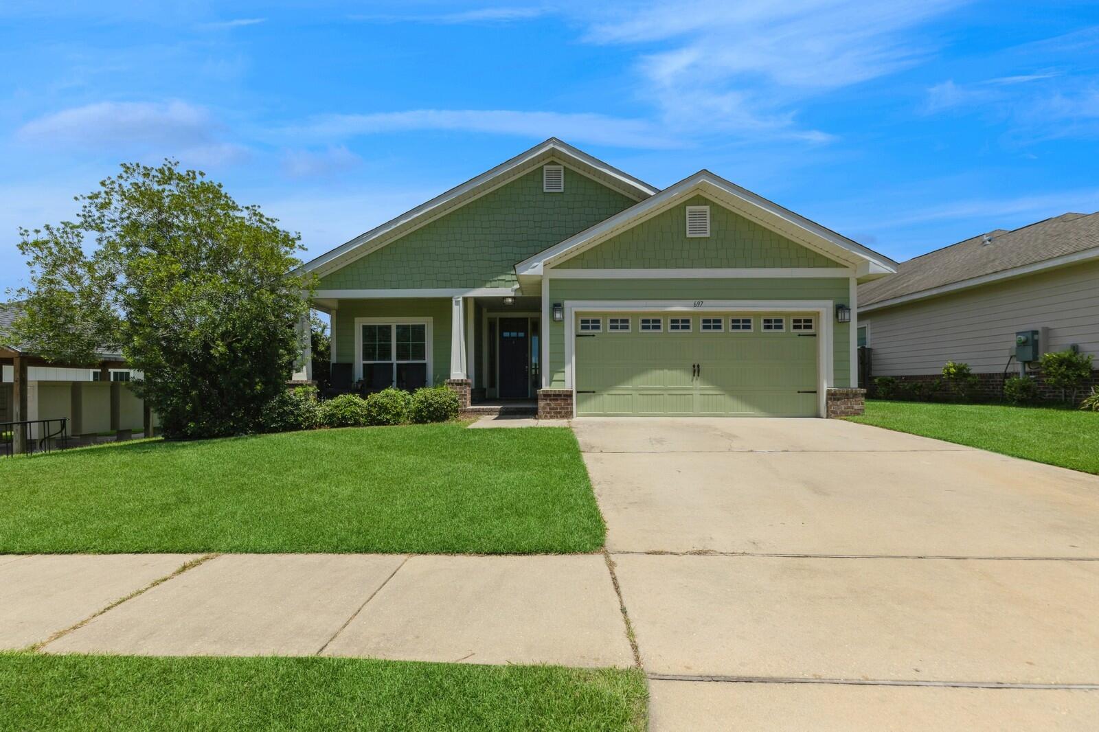 This 4 bedroom, 2 bathroom home in the gated Lafayette Creek Landing is a must see! This inviting single-story home offers an open-concept layout with vaulted ceilings that make the main living areas feel bright and spacious. You'll love the newly installed light-toned vinyl plank flooring that runs throughout the common areas, primary bedroom, and fourth bedroom--bringing a fresh, modern aesthetic along with low maintenance.The heart of the home is the large family room, which flows seamlessly into the kitchen, breakfast nook, and out to the covered lanai--perfect for entertaining or relaxing at home. The primary suite is tucked away at the back for added privacy and features a tray ceiling, and walk-in closet. The primary's en suite bath offers dual vanities, a soaking tub, and a linen closet.
The split floor plan offers privacy. The three additional bedrooms are located toward the front and side of the home, offering plenty of flexibility for guests, a home office, or extra family space.
This property features a lanai and a fully fenced backyard. It is located directly next to the clubhouse, pool, and mailboxes. The Lafayette Creek Landing Community has so much to offer it's residents: clubhouse with kitchen, party room, lounge area, bathrooms, and fitness room; community pool; nature trail to the creek; and a community dock overlooking the lake.
This home is conveniently located less than a half mile from shopping, restaurants, and Publix! What's more?! It's located less than 15 miles from the sugary white sand beaches of the Emerald Coast!
Don't miss out on this wonderful opportunity! Call to schedule a showing today!
Buyer to verify any and all information deemed important to them.