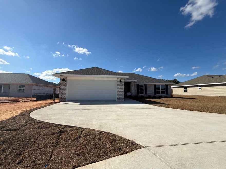 This single-story home offers a spacious layout that will make a family of any size comfortable. Upon entering from the covered front porch there is quick access to the kitchen or keep walking towards the great room. The main living area is centrally located and boasts an open and seamless arrangement. This creates the perfect atmosphere to host an evening and entertain friends and family. The master suite is tucked away from the dining room and offers a well-appointed ensuite bathroom with a double vanity and generous walk-in closet space. The additional rooms are thoughtfully placed on the other side of the home so all family members or guests can enjoy a certain level of privacy. The concrete patio extends your living space outside and provides a great spot for enjoying