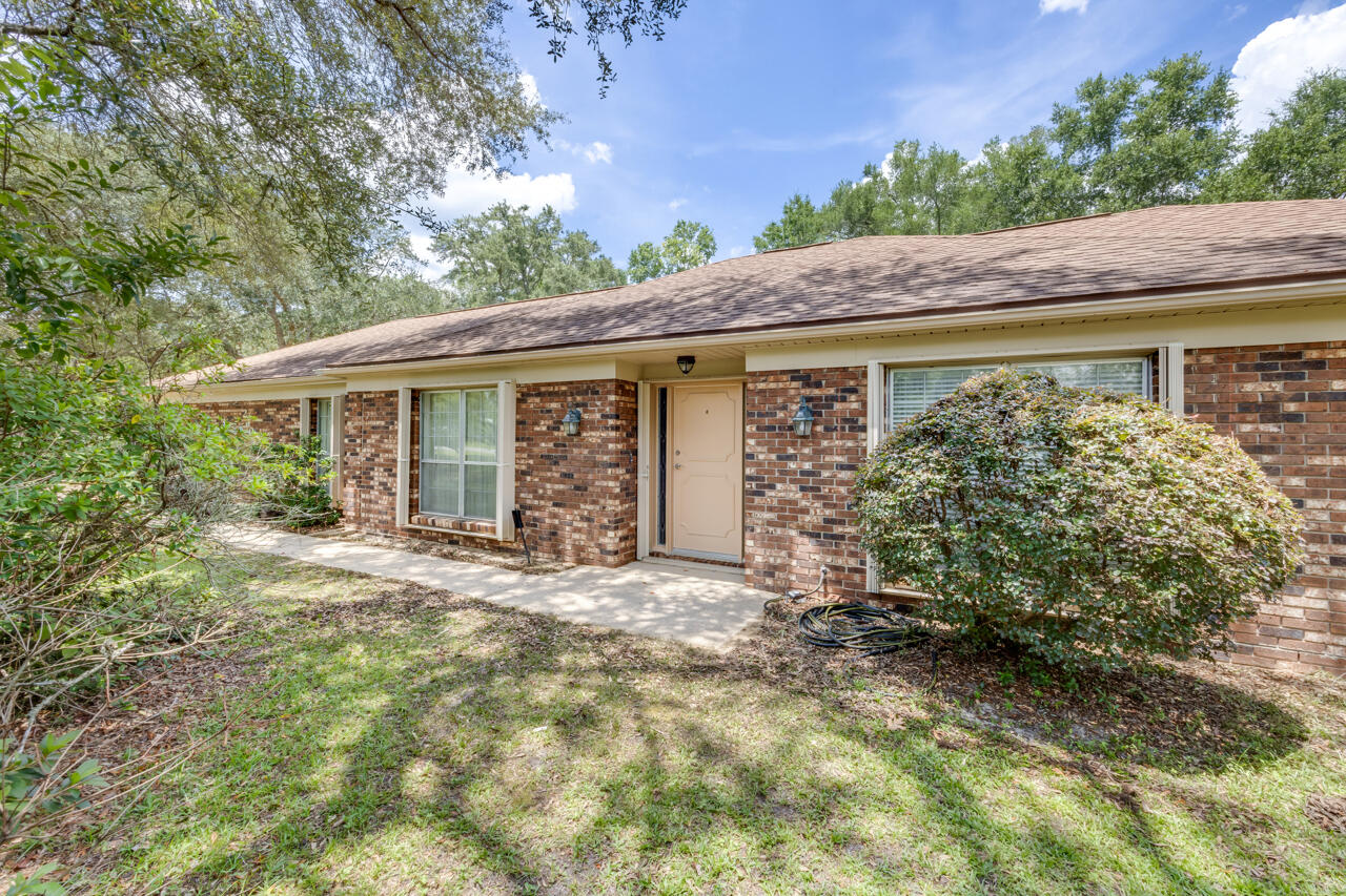 This 1 owner home in Rocky Bayou has endless potential- with the right vision it will be the perfect place to call home! Looking for a hidden gem to transform? Look no further! Features include whole-house Generac system, hurricane shutters, gas fireplace, sprinkler system. Formal dining room, plus 3 additional living spaces, including over 500 sqft of heated and cooled space wrapped with windows- a wonderful place to enjoy your morning coffee! Right in the heart of Niceville, this is a hidden gem! Roof, HVAC 2011.