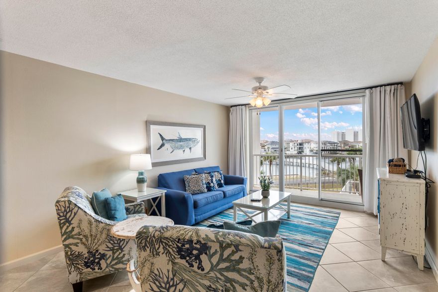 NEW LOW PRICE-Turnkey Investment Opportunity - 4 Minute walk to the beach & over $41,000 in rental revenue in just 10 months,with additional owner usage--showcasing its incredible investment potential!NO assessments on the unit!Highly sought-after Terrace at Pelican Beach. This income-producing property generated High occupancy rates with strong repeat guests due to its prime location and luxurious updates.Turnkey investment,perfect for short-term rentals with no major updates needed.Updated & Move-In ReadyModern kitchen with brand-new shaker cabinets, quartz countertops,& a stylish shiplap surround.New tile flooring throughout, fresh paint, updated furnishings, artwork,& accessories.Spacious open-concept living & dining area designed for relaxation and entertain Resort-Style Amenities & Prime Location

Amazing Tiki Hut beachside!

Deeded beach access to Destin's sugar-white sands and emerald waters.

Resort-style pool, hot tub, fitness center, tennis courts, game room, BBQ grills, and more!

Located across from Big Kahuna's Water & Adventure Park and some of the top dining, shopping, and entertainment.

NEW stadium seating bar and restaurant coming soon thats a 5 minute walk from the unit.

Whether you're looking for a vacation rental or a personal beach getaway, this condo delivers strong ROI with the perfect blend of luxury and location.